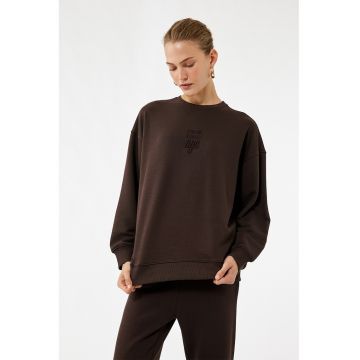 Bluza de trening cu croiala lejera si decolteu la baza gatului